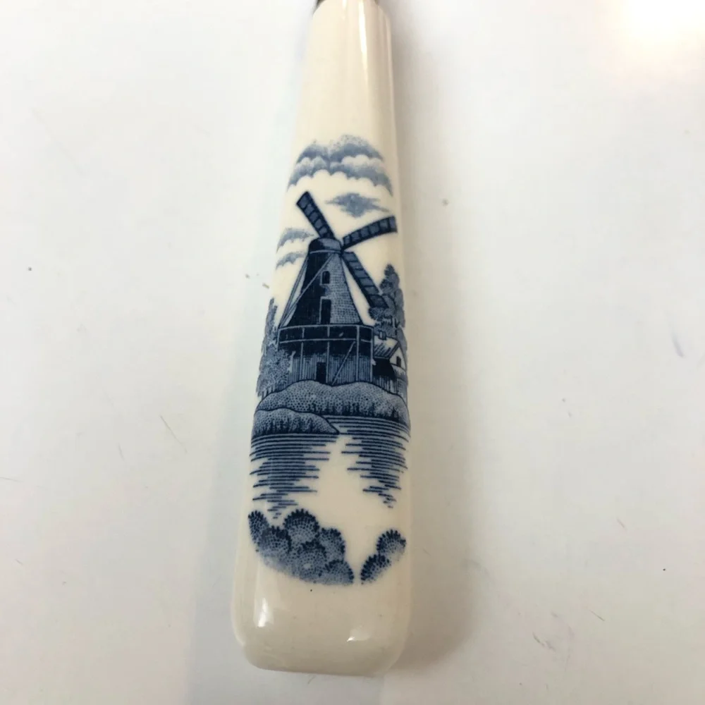 Vintage Elesva Cheese Cutter/Slicer Stainless Knife Blue Windmill Ceramic Handle